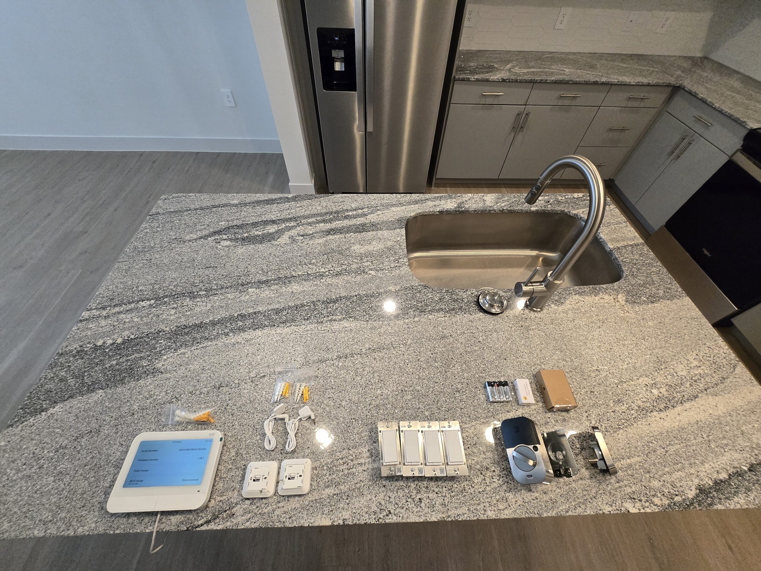 Technician configuring smart apartment devices through centralized mobile control platform